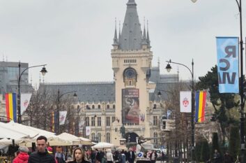 A cathedral building on a crowded street in Iasi, Romania
